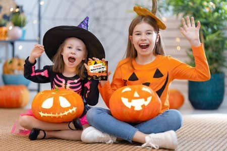 Kids enjoying Holiday Notes From Me!® Halloween Facts & Funnies