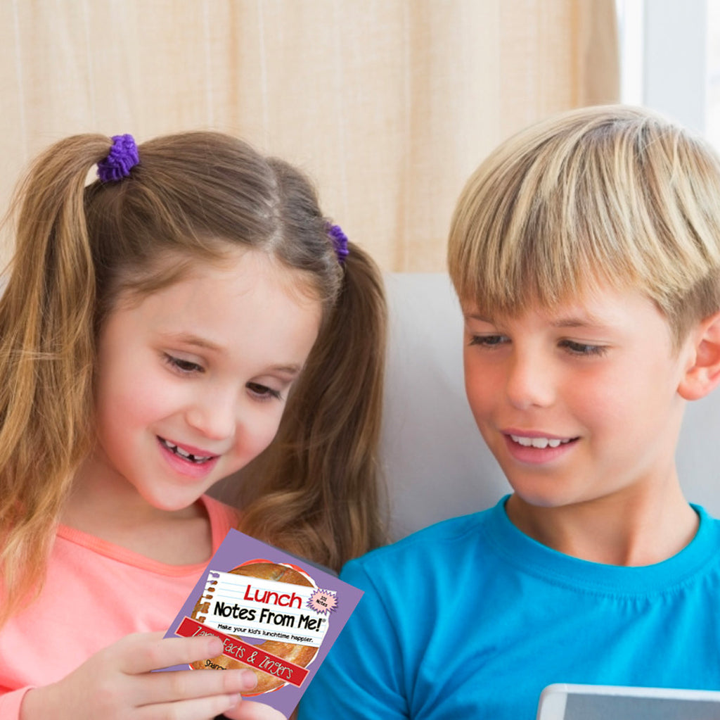 Kids enjoying reading Lnchbox Lunch Notes From Me!® Zany Facts & Zingers